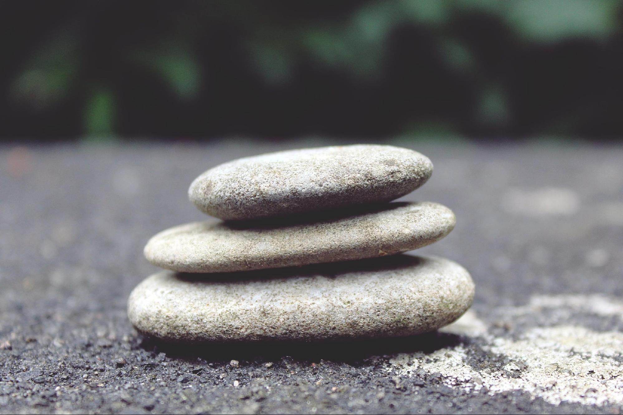 A zen pile of flat rocks icon